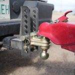 Axiom adjustable trailer hitch with a heavy-duty steel construction, featuring multiple height adjustment positions for towing different trailers and loads.