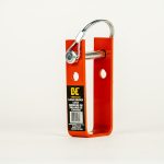 Lever-style load binder with safety lock engaged, securing a transport chain to keep heavy cargo stable during hauling.