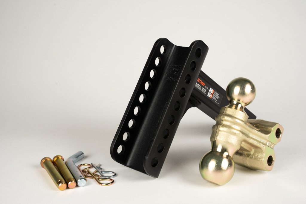 Adjustable 14K and 20K trailer hitches designed for heavy-duty towing, featuring adjustable height settings and durable steel construction for secure hauling.