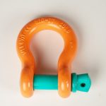 Heavy-duty steel shackles used for connecting chains, straps, or lifting equipment, designed for secure load handling and rigging applications.