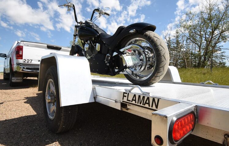 Trailers hauling motorcycle
