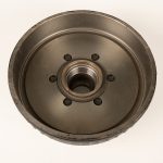 Complete one piece hub and drum kit for 3.5K to 7K axles with 5-lug, 6-lug, or 8-lug bolt patterns and 1/2 inch to 5/8 inch wheel studs on white background
