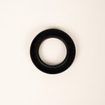 Dexter 010-010-00 trailer grease seal designed for hub and axle assemblies, helping protect wheel bearings from dirt, moisture, and debris to ensure reliable trailer performance and longer component life.