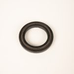 Close-up of trailer axle seals designed to prevent grease leaks and protect wheel bearings from dirt, moisture, and contaminants.
