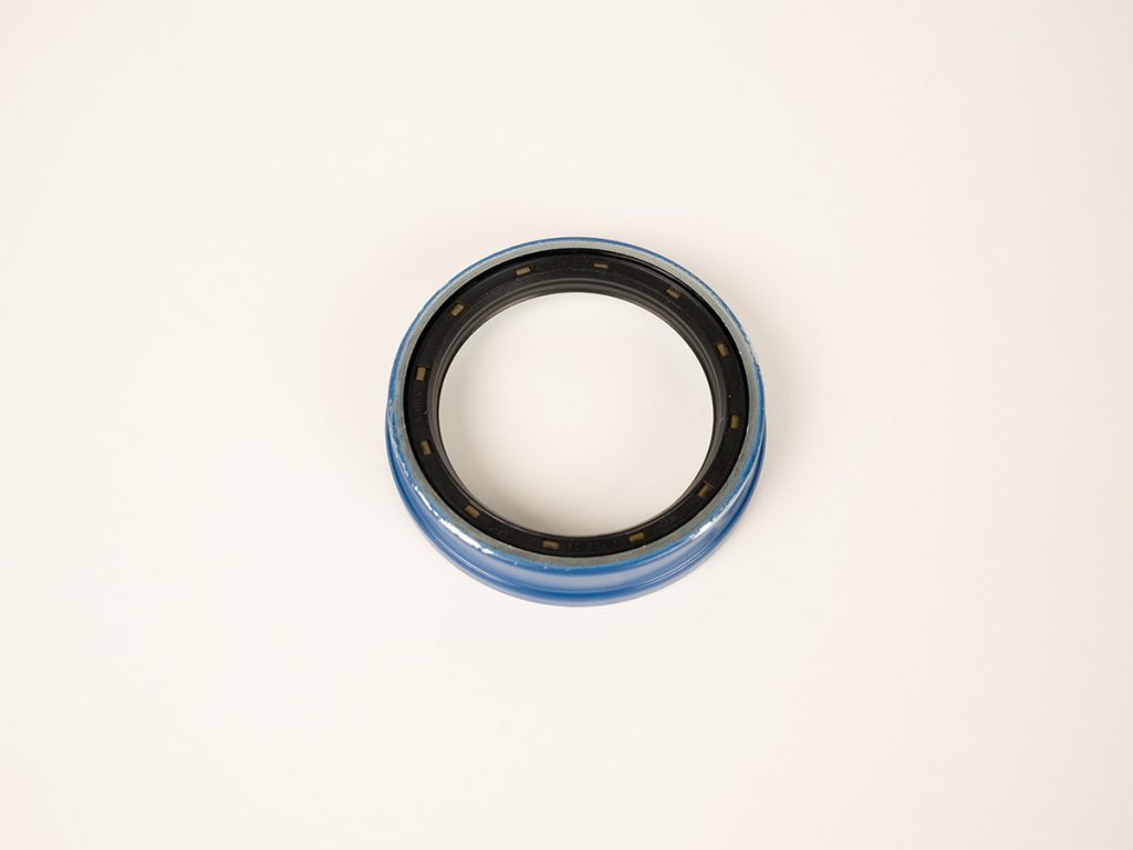 Dexter 010-257-00 trailer grease seal for hub and axle assemblies, designed to protect wheel bearings from dirt, moisture, and debris to ensure reliable trailer performance and extended component life.
