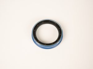 Dexter 010-257-00 trailer grease seal for hub and axle assemblies, designed to protect wheel bearings from dirt, moisture, and debris to ensure reliable trailer performance and extended component life.