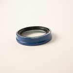 Dexter 010-257-00 trailer grease seal for hub and axle assemblies, designed to protect wheel bearings from dirt, moisture, and debris to ensure reliable trailer performance and extended component life.