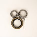 Trailer brake hub and drum kit for 3.5K to 7K axles with 5-lug or 8-lug pattern and 1/2 inch to 9/16 inch wheel studs displayed on white background