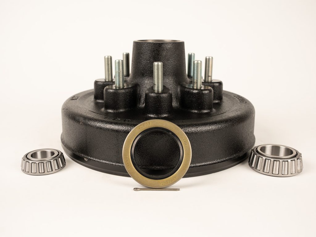 Trailer brake hub and drum kit for 3.5K to 7K axles with 5-lug or 8-lug pattern and 1/2 inch to 9/16 inch wheel studs displayed on white background