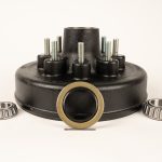 Trailer brake hub and drum kit for 3.5K to 7K axles with 5-lug or 8-lug pattern and 1/2 inch to 9/16 inch wheel studs displayed on white background
