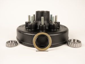 Trailer brake hub and drum kit for 3.5K to 7K axles with 5-lug or 8-lug pattern and 1/2 inch to 9/16 inch wheel studs displayed on white background
