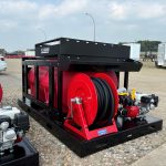 300-gallon high-pressure fire suppression skid unit mounted on a steel frame, designed for emergency fire response with pump, tank, and hose system for rapid water or foam application.