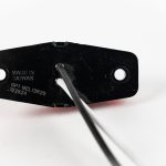 Mini Oblong 2-LED Surface Mount Marker Light. Back view showing ground wires.