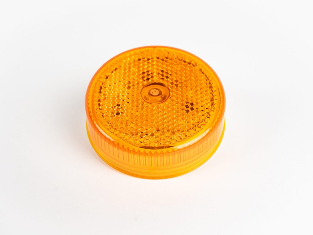 Yellow 2-1/2 inch Round 8-LED Grommet Mount Marker Light shows commercial vehicle dimensions. Also used as a clearance light.
