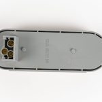 Bottom of Red 6 inch Oval 10-LED Grommet Mount Tail Light. Showing access for 3-wire electrical connection.