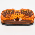 Bullseye Marker Light MC42AB surface mount with yellow (amber) lens. Showing single electrical wire. Also works as clearance light.