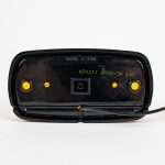 Back of Bullseye Marker Light MC42AB surface mount with yellow (amber) lens. Showing single electrical wire.