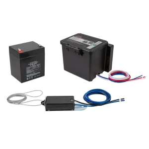 CURT Push-to-Test trailer breakaway kit featuring a 12V rechargeable battery, top-loading battery case with wiring, and breakaway switch with steel lanyard.