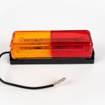 Dual Red/Yellow Thinline 10-LED Surface Mount Fender Light Kit on mount with electrical wire and connector.