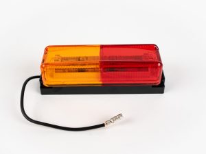 Dual Red/Yellow Thinline 10-LED Surface Mount Fender Light Kit on mount with electrical wire and connector.