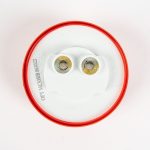 Back of red 2 inch Round Clearance Light showing pre-greased plug-in for 2-prong electrical wiring.