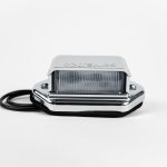 Oblong 2-LED License Plate Light with chrome ABS housing, polycarbonate lens, 2 wires, chrome cover & mount.