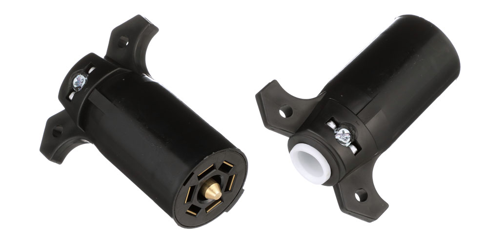 Dual view showing front brass contacts and rear cable entry of Pollak 11-700 7-way RV blade trailer plug connector.