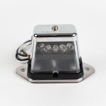 Rectangle 5-LED License Plate Light, showing clear housing, lens, & 5 white light emitting diodes.