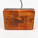 Amber Rectangle Stud Mounted Marker Light MC36AB, showing incandescent bulb, 2-screw lens and single power wire. Mounts on trailer as side marker or clearance light.