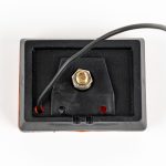 Back of Amber Rectangle Stud Mounted Marker Light MC36AB, showing mounting stud and single power wire. Mounts on trailer as side marker or clearance light.