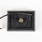Back of Amber Rectangle Stud Mounted Marker Light MC36RB, showing mounting stud and single power wire. Mounts on trailer as side marker or clearance light.