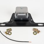 Round Mini License Plate Light with Steel Bracket, single black power wire, & mounting hardware. Illuminates license number.