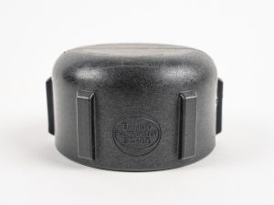 Black Banjo polypropylene female pipe cap with raised gripping ribs stamped with "BANJO POLYPROPYLENE SCH80".